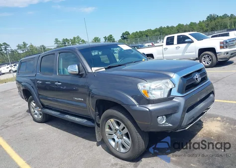 2015 Toyota Tacoma Base V6 z USA, uszkodzony, nr VIN 3TMLU4EN1FM177255